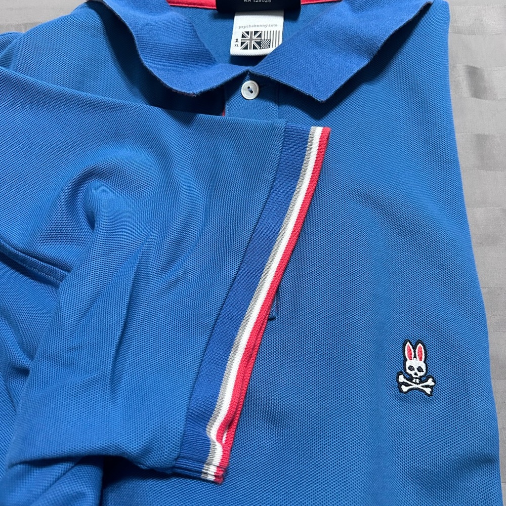 Psycho Bunny Blue Polo with Red and White Accents